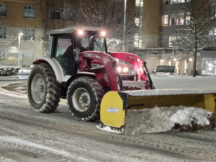 Close-up of the Nansan Farms tractor and plow blade